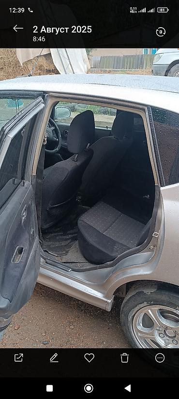 Toyota: Toyota Дуэт: 2002 г., 1.3 л, Механика, Бензин, Хэтчбэк — 7