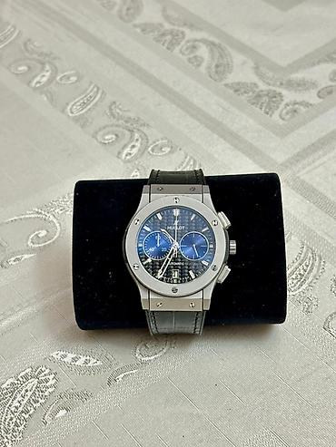 mi saat: Hublot kişi qol saatı – avtomatik mexanizm, xronoqraf Xüsusiyyətlər — 1