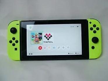 Nintendo Switch: Nintendo Switch, čipovana konzola u odličnom stanju. Čipovana — 29