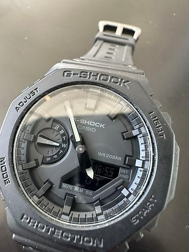 Наручные часы: G-SHOCK GA-2100 seriyasından olan bu saat, hərbi üslublu mat qara — 3