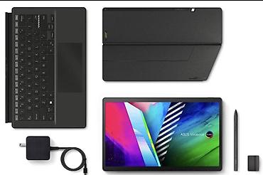 compaq notebook: ASUS Vivobook seriyasına aid 2-si 1-də noutbuk-planşet modeli. Cihaz — 1