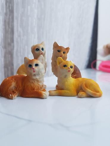 Oyuncaqlar: 4 ədəd fərqli pozalarda mini narıncı pişik fiqurları satılır — 1