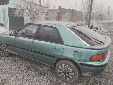 зеленая ferrari: Mazda 323: 1992 г., 1.8 л, Механика, Бензин