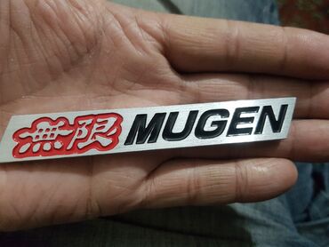 Тюнинг: Алюминиевый шильдик MUGEN. 11 см X 1.5 см. Толщина 3мм. Сзади
