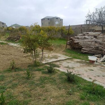 torpaq xaçmaz: 20 sot bağ içində quyusu,yarım tikilmiş evi,işığıda var qiymət