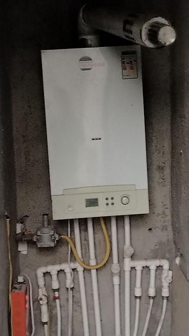 divar paneli: UNI-THERM qaz kombi sistemi - Marka/model: UNI-THERM (Better Heating — 2