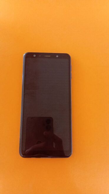 сотовый телефон fly ezzy 9: Samsung Galaxy A7 2018, 64 ГБ, цвет - Голубой, Отпечаток пальца