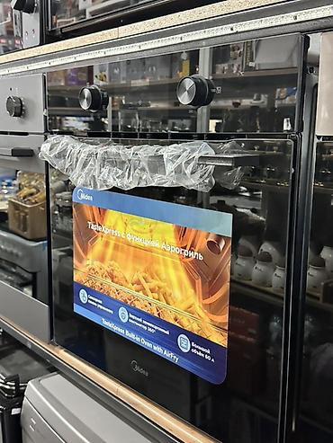 Техника для кухни: Встраиваемая электрическая духовка Midea TasteXpress с функцией — 1