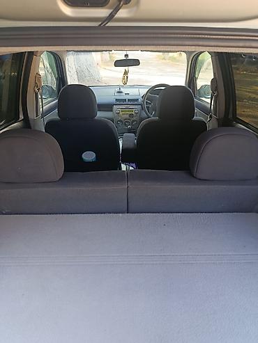 айни 95: Mazda Demio: 2005 г., 1.5 л, Автомат, Бензин, Хэтчбэк — 7