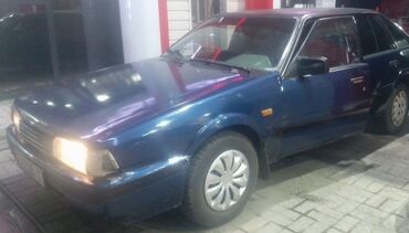 гибридный автомобиль: Mazda 626: 1986 г., 1.8 л, Механика, Бензин, Хэтчбэк