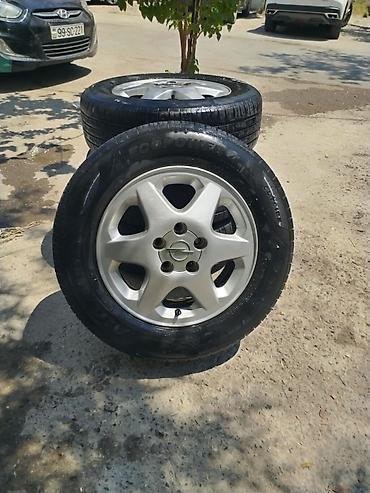 opel təkərləri: 205*15*65. OPEL UCUN IDEAL VEZIYYETDEDIR . TEKERLERI TEZE PAKOVKADA — 2