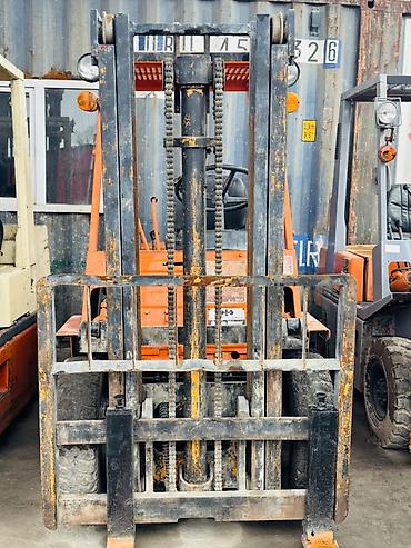 2003: Погрузчик, Komatsu, 2003 г., Колесный, Вилочный — 2