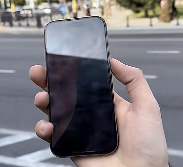 electronics iphone: IPhone 16 Pro, 128 GB, Desert Titanium, Barmaq izi, Face ID, Simsiz şarj — 2