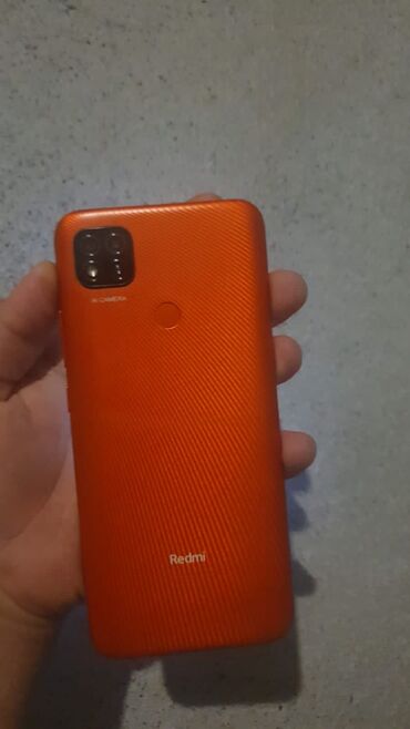 fly bl7405 телефон: Xiaomi Redmi 9C, 32 ГБ, цвет - Красный, 
 Отпечаток пальца, Face ID