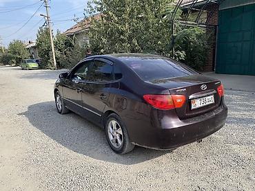 зеркадо: Hyundai Elantra: 2010 г., Механика, Бензин, Седан — 4