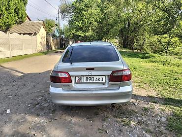 армянский учет: Mazda 626: 1999 г., 1.8 л, Механика, Бензин, Седан — 2
