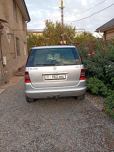 полный комплектация: Mercedes-Benz ML (W163) — интерьер и оснащение - Салон из черной — 6