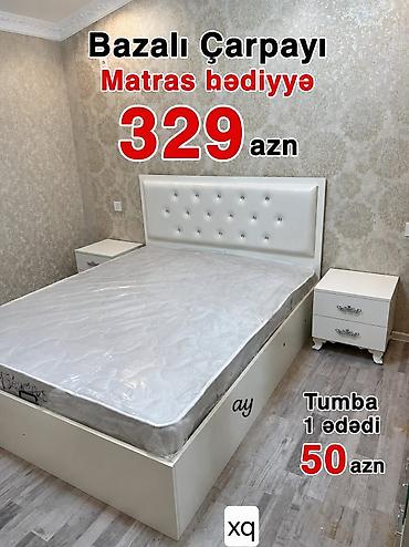 heri sekilleri: Bazalı çarpayı – ağ rəngdə, yumşaq süni dərili başlıqla. Başlıqda — 1