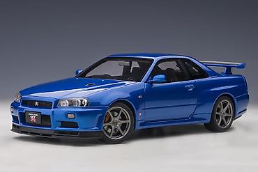 gitare cena: 💙 Nissan Skyline GT-R (R34) V-Spec II – Bayside Blue – 1:18 – Autoart — 1