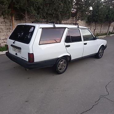 Tofas: Model: Tofas Kartal (universal kuzov) Rəng: Ağ Kuzov: 5 qapılı — 4