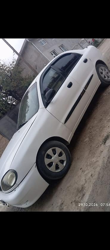 бак мега: Daewoo Lanos: 1999 г., Механика, Бензин, Седан — 4