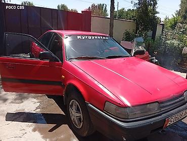 Транспорт: Mazda 626: 1991 г., 2 л, Механика, Бензин, Седан — 8