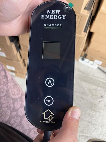 elektrik acar: Elektrikli avtomobillər üçün “New Energy Charger” şarj cihazı. Adi — 1