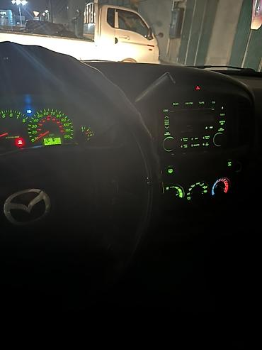 Mazda: Mazda Tribute: 2002 г., Автомат, Бензин, Кроссовер — 12