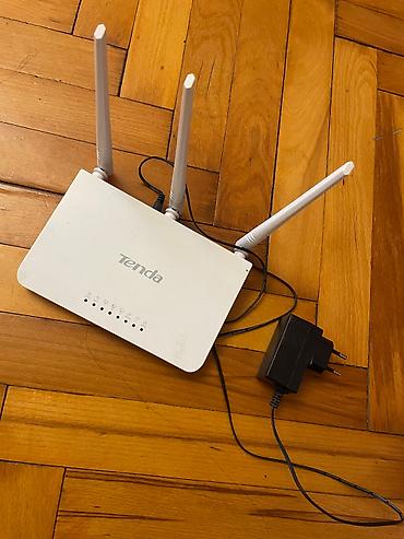 saz modem satilir: Tenda N300 modemi.yeni kimidir.hec bir problemi yoxdur.elave sual olsa — 3