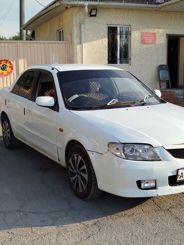 ml 163: Mazda 323: 2001 г., 1.5 л, Автомат, Бензин, Седан
