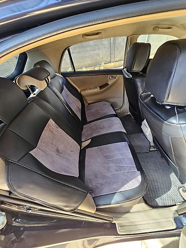 ремонт golf: Toyota Allex:Хэтчбек 5‑дверный, темно-фиолетовый металлик. Компактный — 2