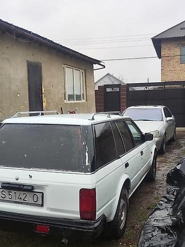 byd e1: Nissan Bluebird: 1988 г., 2 л, Механика, Универсал — 4