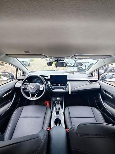 левин гибрид: Toyota Corolla: 2023 г., 1.8 л, Гибрид, Седан — 4