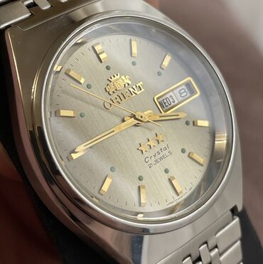 Qol saatları: İşlənmiş, Qol saatı, Orient, rəng - Qızılı — 2