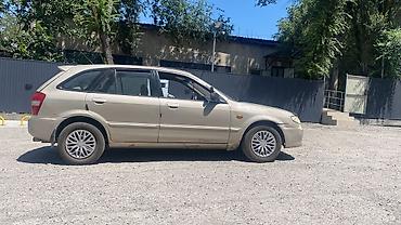 рекистон пикап: Mazda 323: 2001 г., 1.6 л, Автомат, Бензин, Универсал — 3