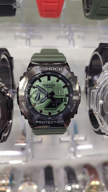 qol saati casio: CASIO G‑SHOCK saatları – GA‑2100/CasiOak seriyası Məhsul təsviri: - — 6