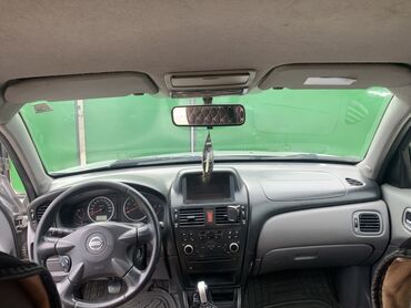 дом на калеса: Nissan Almera: 2003 г., 1.5 л, Механика, Бензин, Седан