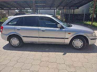 a8 d2: Mazda Familia: 1999 г., 1.6 л, Механика, Бензин, Универсал — 3