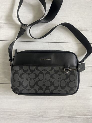 ювелирные изделия из золота: Барсетка Coach мужская 
Состояние: новое