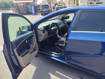 Hyundai: Hyundai Elantra GT, mavi rəng, hetçbek kuzov. - Güclü və qənaətcil — 17