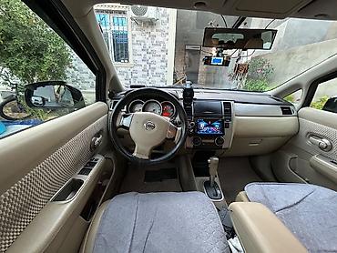Транспорт: Nissan Tiida: 1.5 л | 2011 г. Хэтчбэк — 7