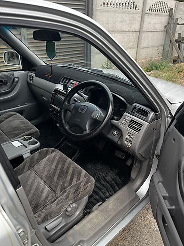 машина гибрид марки: Honda CR-V: 1999 г., 2 л, Автомат, Бензин, Кроссовер — 1