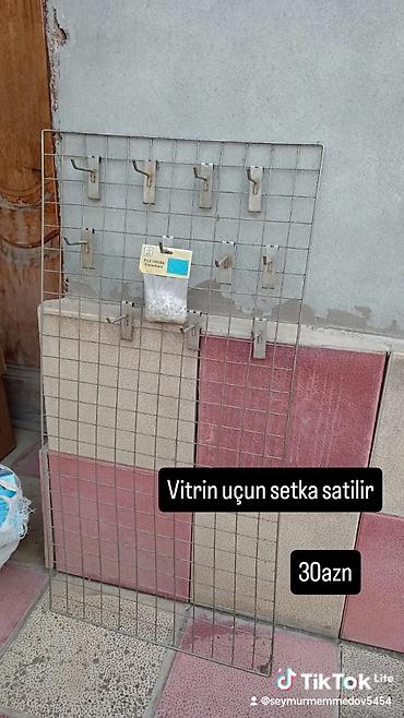 setqa qapılar: Setka demirlər ustunde verilir — 1