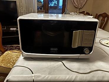 mercedes mikro: De’Longhi Sfornatutto mikrodalğalı soba - Rəng: ağ/qara ön panel - Ön — 1
