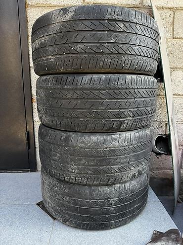 44 2: Комплект шин Bridgestone 235/40 R19 92V M+S пара хорошая, пара слабая — 1