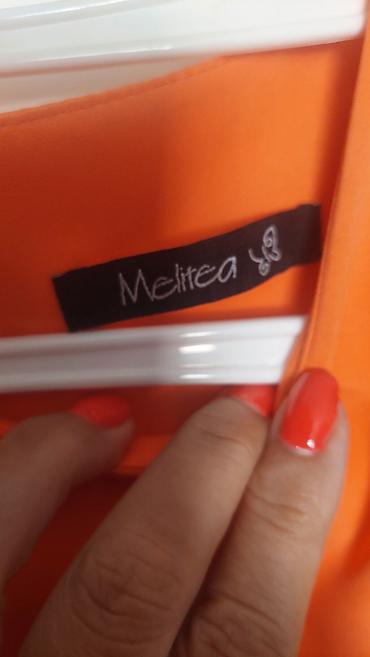torbe m: Haljina Melitea – narandžasta, midi dužina - Brend: Melitea (etiketa — 3