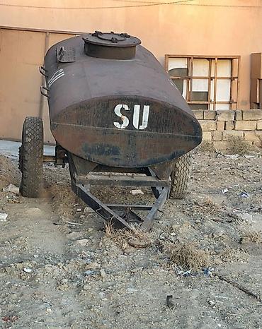 bağ traktörü: İkioxlu qoşqu üzərində metal su çəni. - Tutumu: təxmini 3–5 ton — 1