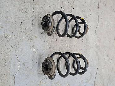 Springs: OPRUGA AMORTIZERA T31 ZA NISSAN X-TRAIL OD 2007. DO 2013. GOD. | — 1
