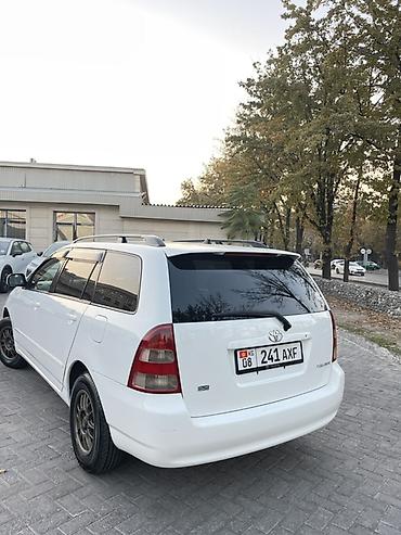 марк таета: Toyota Corolla: 2002 г., Бензин, Универсал — 3
