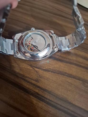 Aksesuarlar: Omega Seamaster avtomatik saat - Korpus və qolbaq: paslanmayan — 2